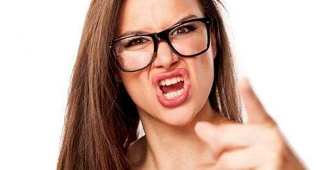 Woman yelling at employees How to tell if you are working for a bully